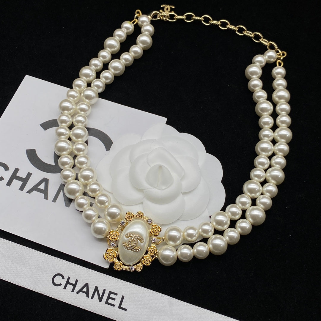Élégant collier double perle