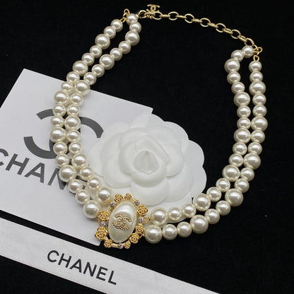 Élégant collier double perle