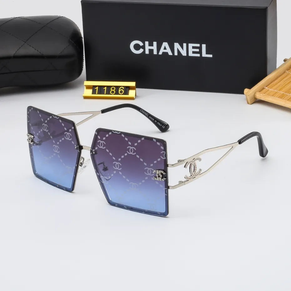 Lunettes de soleil rétro avec monture en métal et lettres en filigrane
