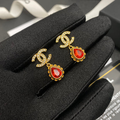 Boucles d'oreilles pendantes vintage avec gemmes rouges