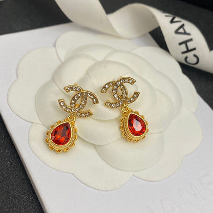 Boucles d'oreilles pendantes vintage avec gemmes rouges