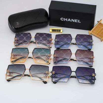 Lunettes de soleil rétro avec monture en métal et lettres en filigrane