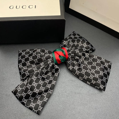 Pince à cheveux Monogram Bow