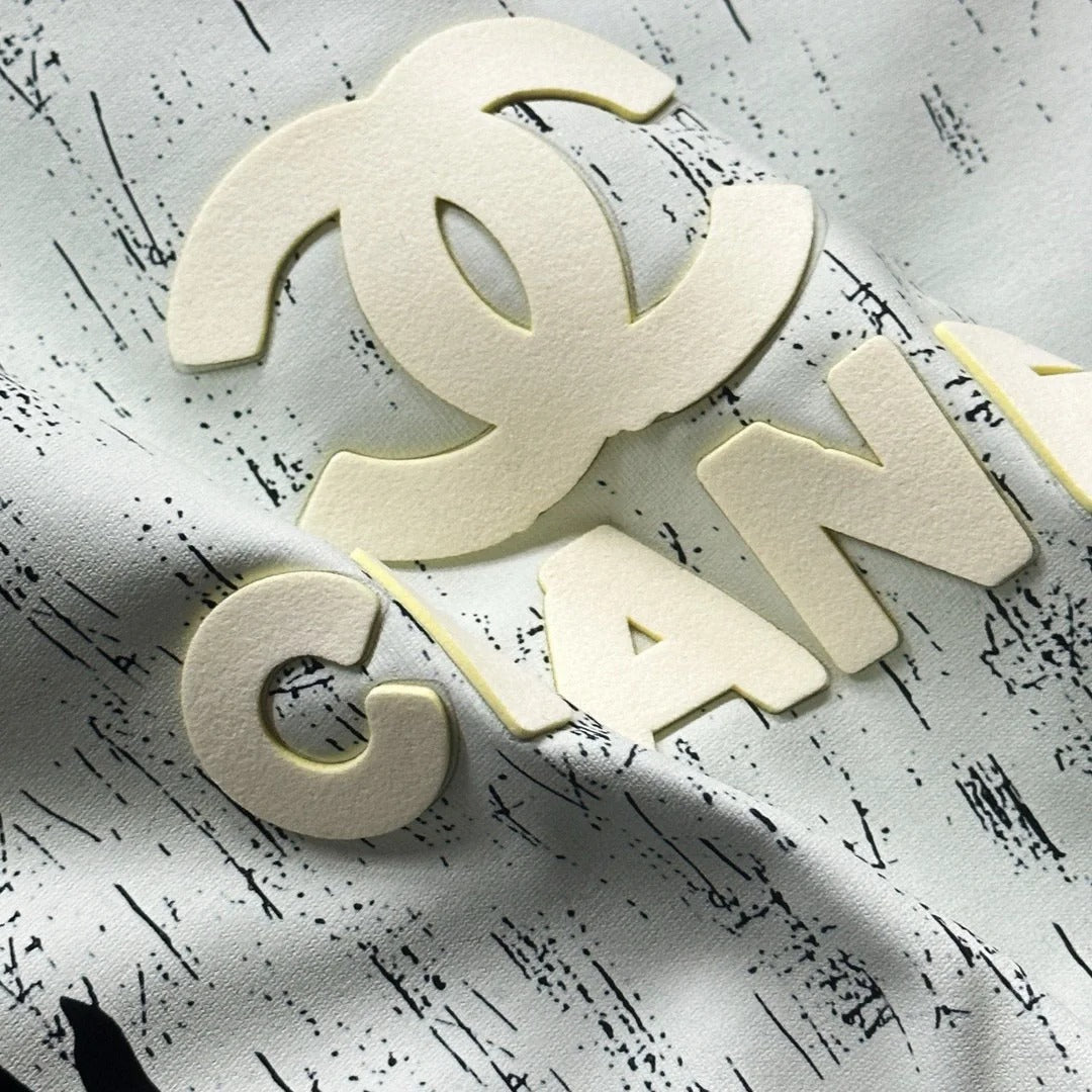 Grand t-shirt décontracté à manches courtes avec logo graffiti tridimensionnel