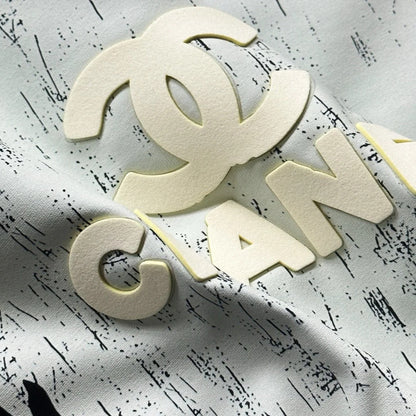 Grand t-shirt décontracté à manches courtes avec logo graffiti tridimensionnel