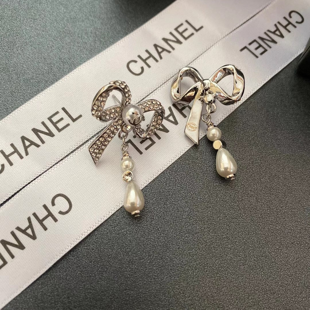 Boucles d'oreilles nœud en diamant de cristal de tempérament