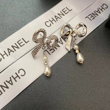Boucles d'oreilles nœud en diamant de cristal de tempérament