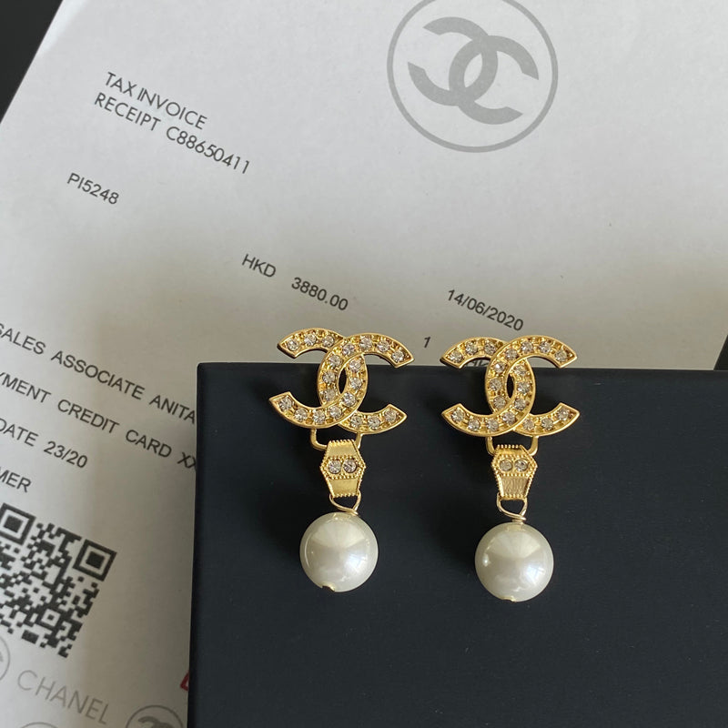 Boucles d'oreilles pendantes diamant et perle