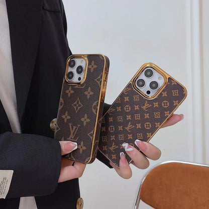Étui en cuir monogrammé à cadre métallique