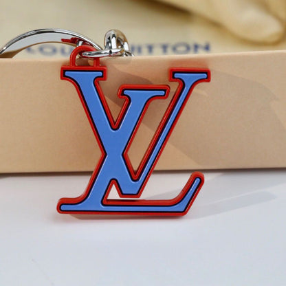 Porte-clés pendentif lettre rouge et bleue