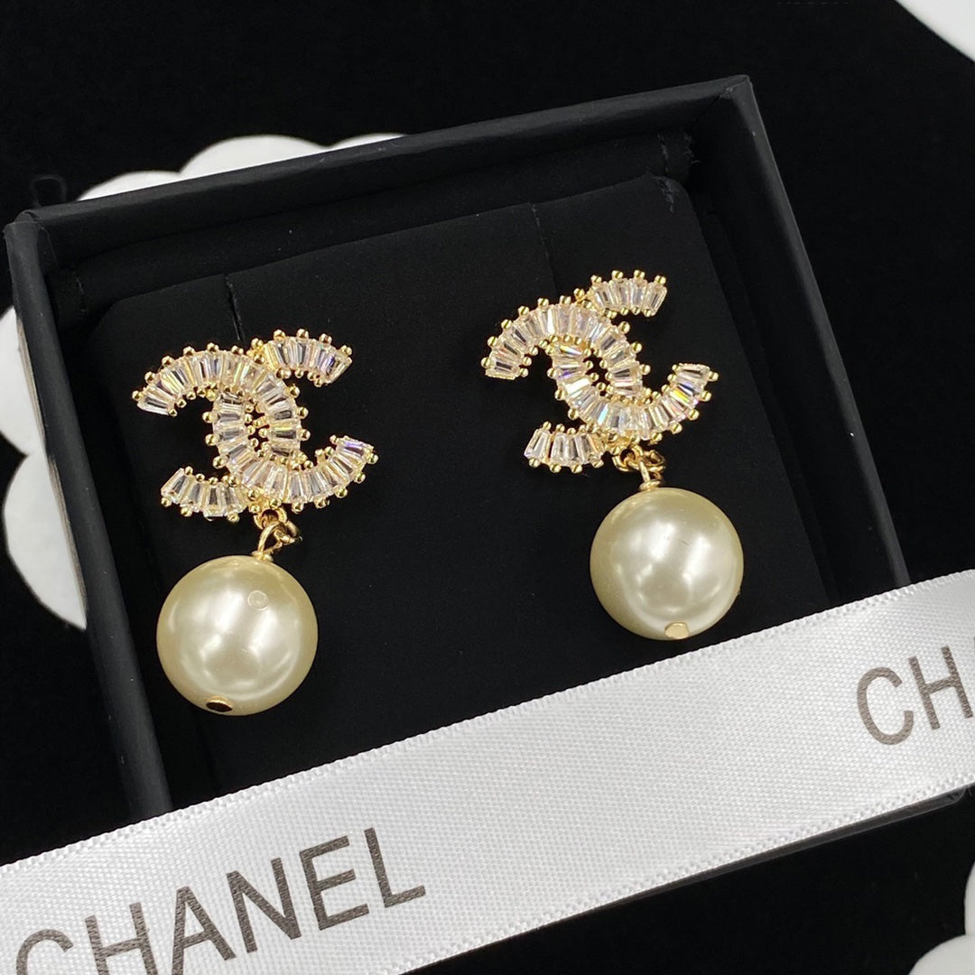 Boucles d'oreilles pendantes en perles de zircon étincelantes