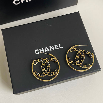 Boucles d'oreilles en cuir noir et ton or