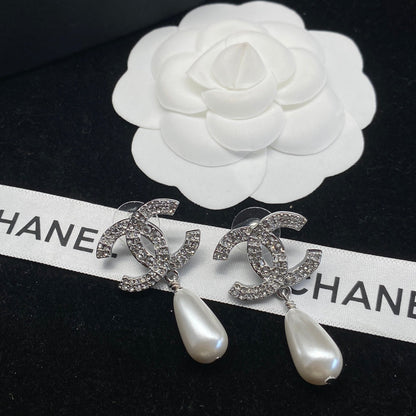 Boucles d'oreilles pendantes alphabet diamant et perles