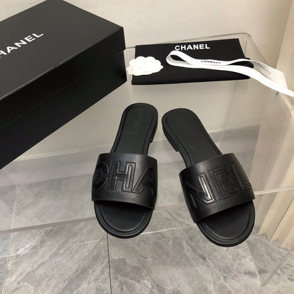 Mules en cuir motif alphabet blocs de couleur