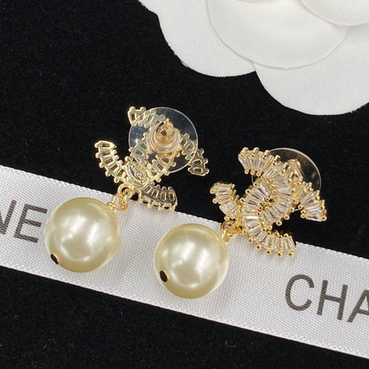 Boucles d'oreilles pendantes en perles de zircon étincelantes