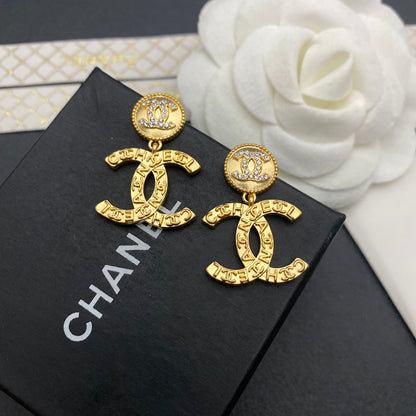 Boucles d'oreilles pendantes vintage Double C