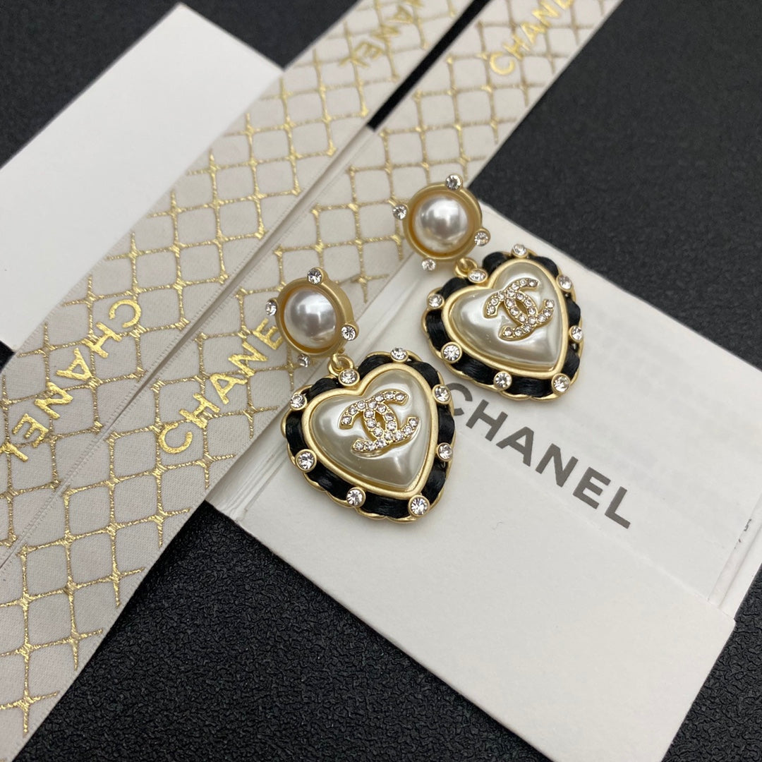 Boucles d'oreilles cœur perle en cuir