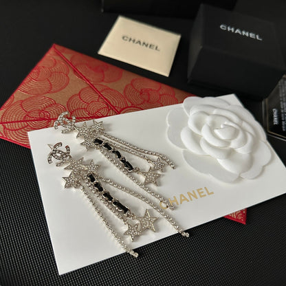 Pendientes largos con colgante de estrella de diamantes de imitación
