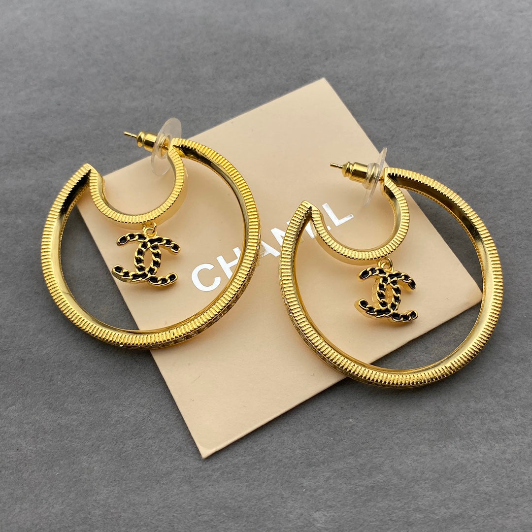 Boucles d'oreilles pendantes lune double C