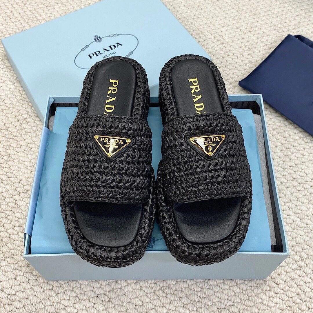 Pantuflas con logotipo de triángulo tejido