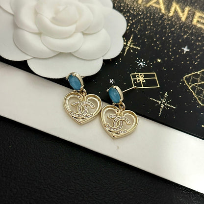 Pendientes vintage de corazón con gema azul
