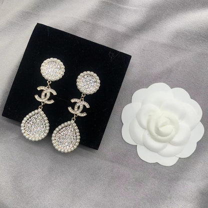 Pendientes de perlas con diamantes completos