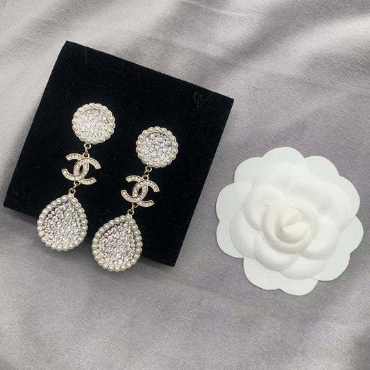 Boucles d'oreilles perles et diamants
