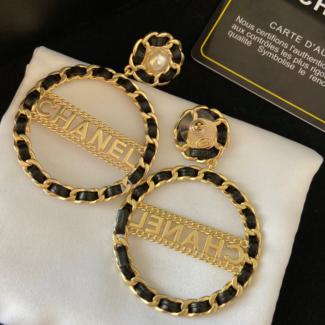 Boucles d'oreilles créoles larges en cuir tressé, fantaisie