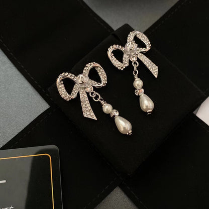 Boucles d'oreilles nœud en diamant de cristal de tempérament