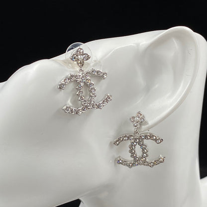 Boucles d'oreilles fleur scintillante en zircon