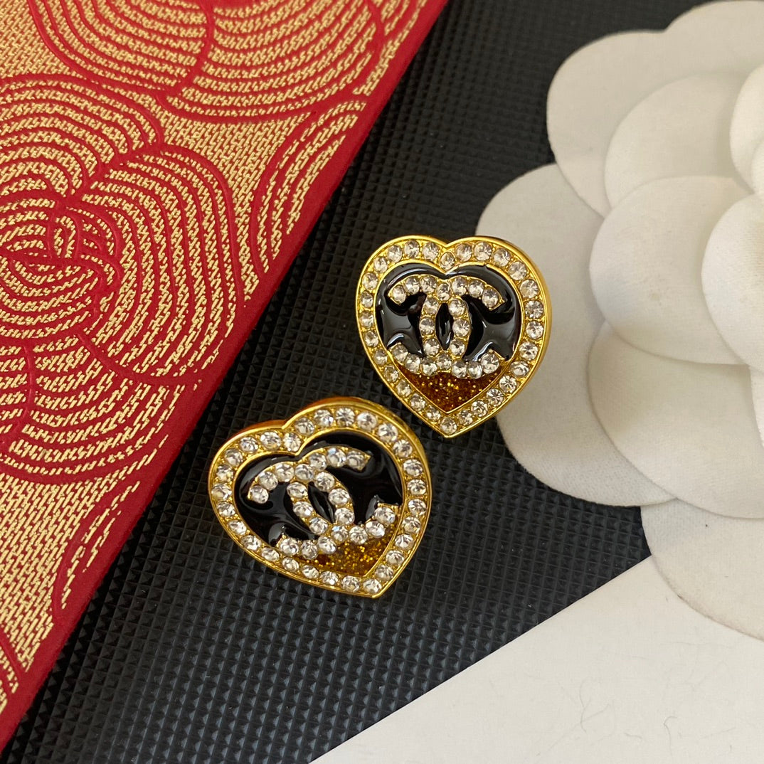 Boucles d'oreilles clous cœur à paillettes