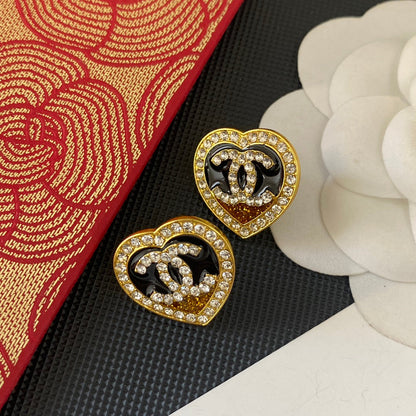 Boucles d'oreilles clous cœur à paillettes