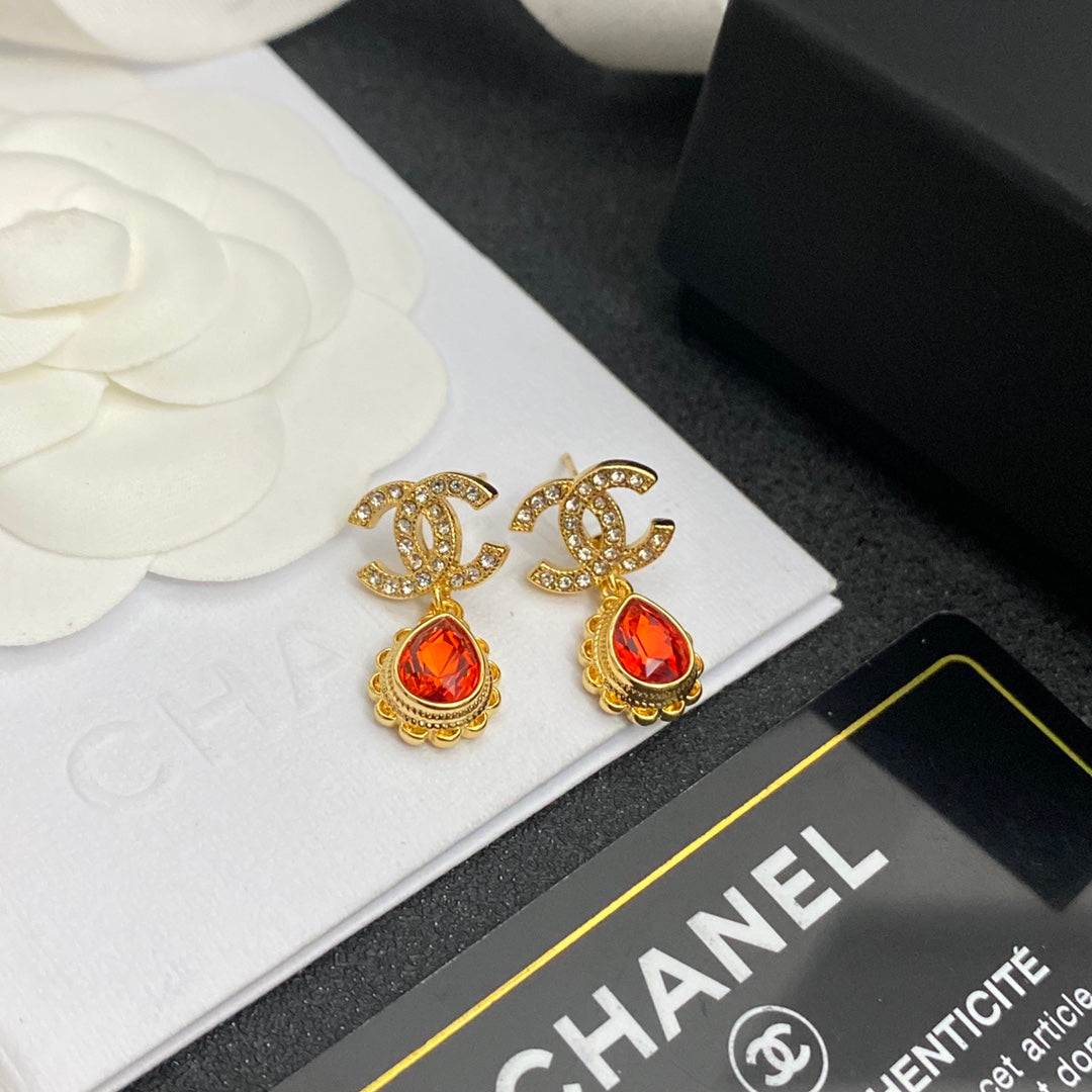 Boucles d'oreilles pendantes vintage avec gemmes rouges