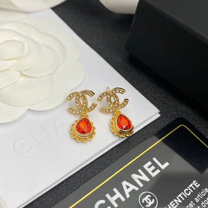 Boucles d'oreilles pendantes vintage avec gemmes rouges