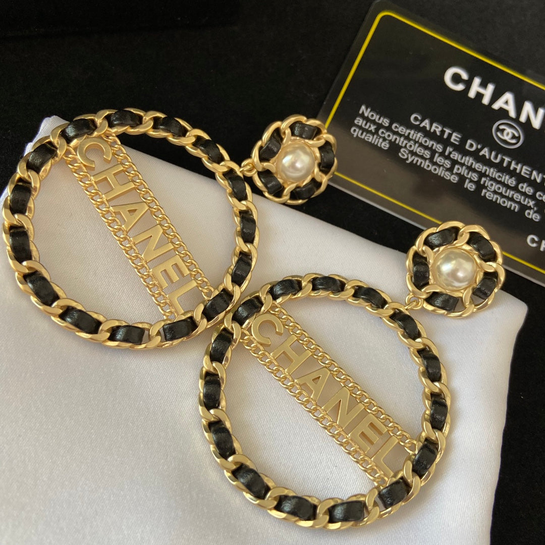 Boucles d'oreilles créoles larges en cuir tressé, fantaisie