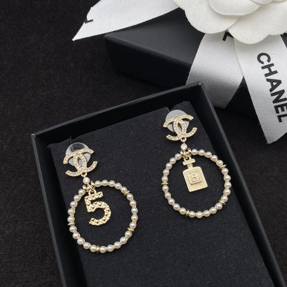 Pendientes de perlas con colgante de botella de perfume Lucky 5
