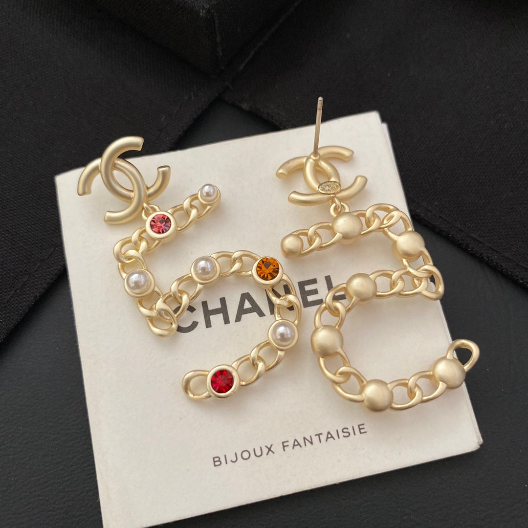Nouvelles boucles d'oreilles n°5 en diamant de couleur