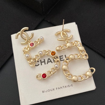 Nouvelles boucles d'oreilles n°5 en diamant de couleur