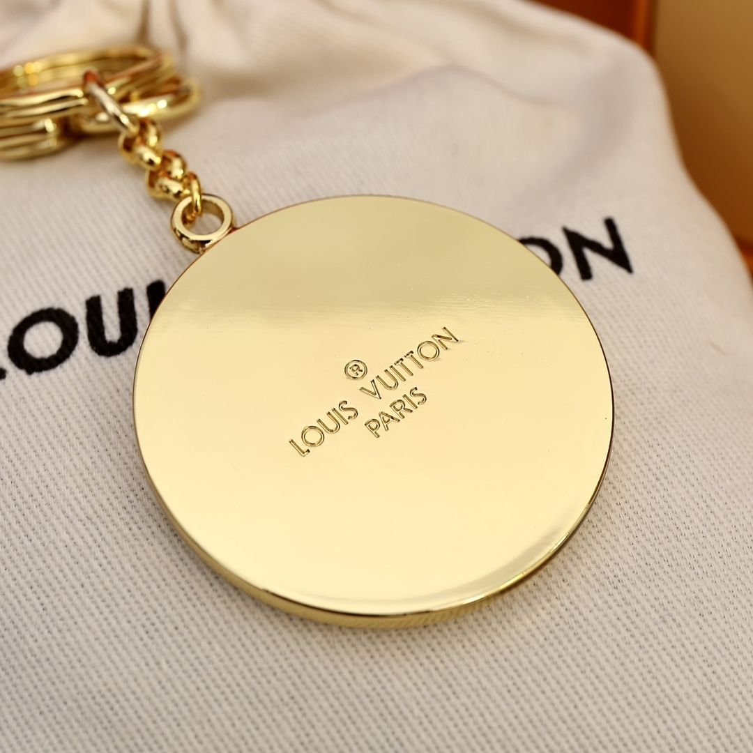 Porte-clés pendentif rond entièrement serti de diamants