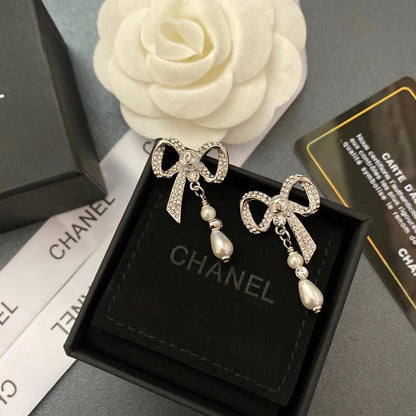 Boucles d'oreilles nœud en diamant de cristal de tempérament