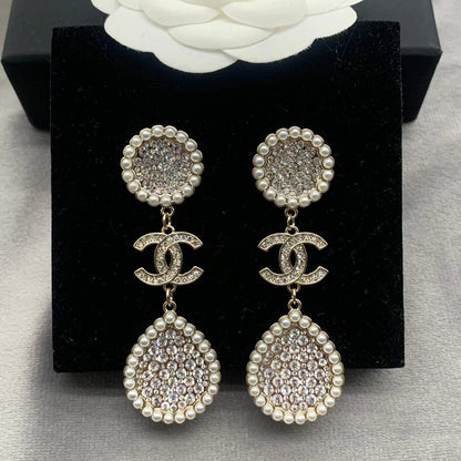 Pendientes de perlas con diamantes completos
