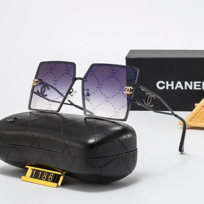 Lunettes de soleil rétro avec monture en métal et lettres en filigrane