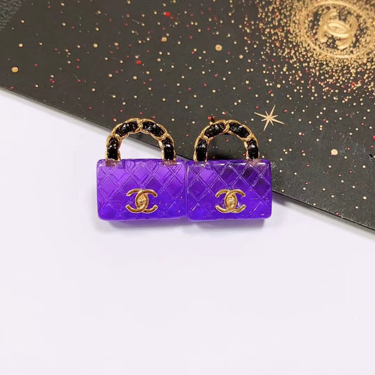 Boucles d'oreilles sac élégantes violettes