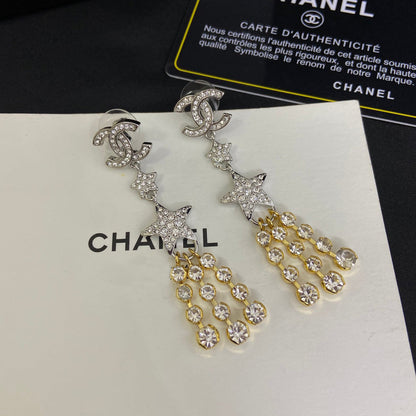 Boucles d'oreilles pendantes étoile en zircon étincelant
