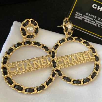 Boucles d'oreilles créoles larges en cuir tressé, fantaisie