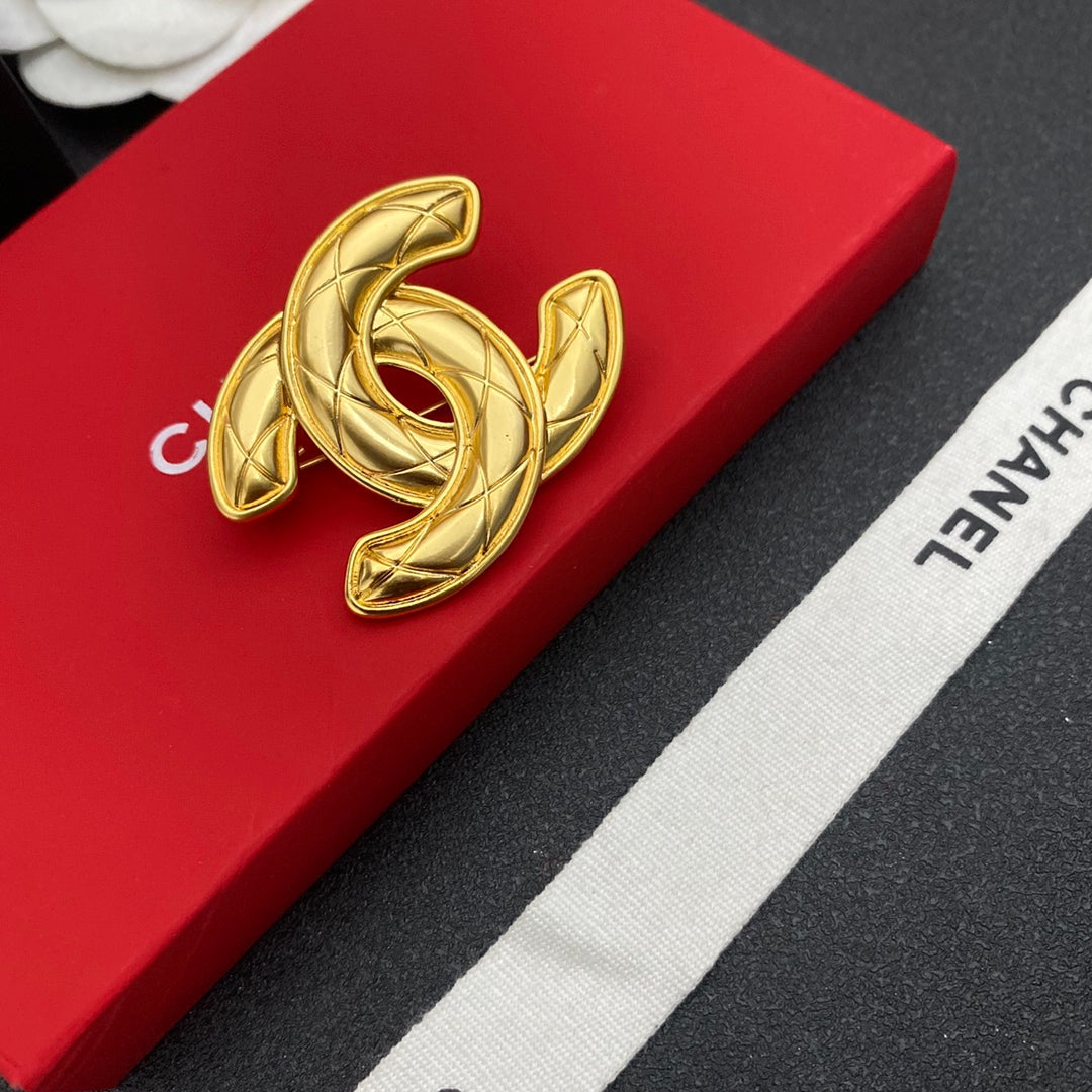 Broche à motif losange