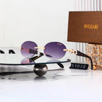 Luxury Rimless Wave Cut Oval Sunglasses - 51032