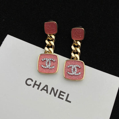 Boucles d'oreilles émaillées rose étincelant