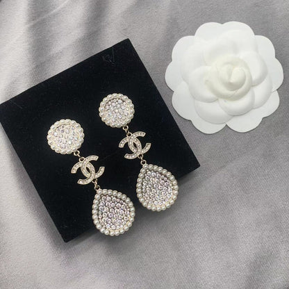 Pendientes de perlas con diamantes completos