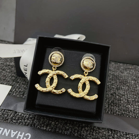 Boucles d'oreilles pendantes en cristal métallique